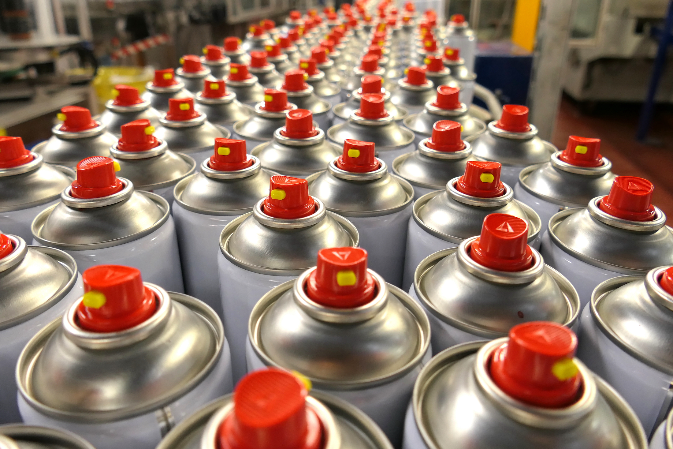 Aerosol cans in factory