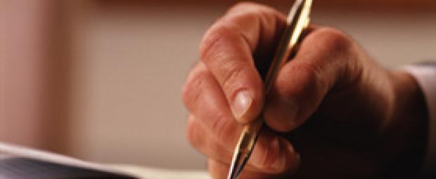 Hand with pen